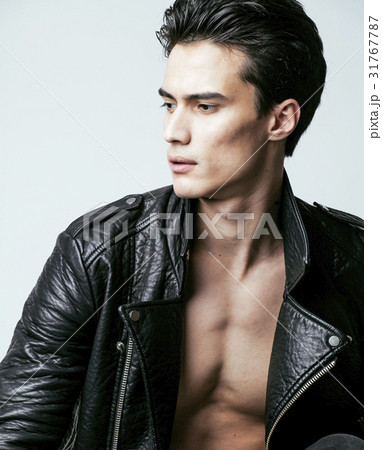 young handsome man, leather jacked on naked torso young handsome man, leather jacked on naked torso 31767787