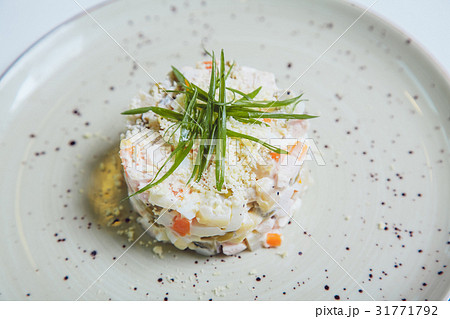 Russian traditional salad olivier with pea. 31771792