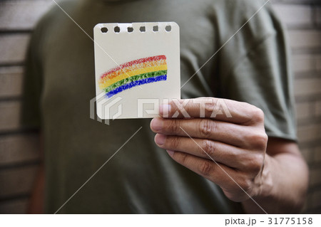 man with a rainbow flag 31775158