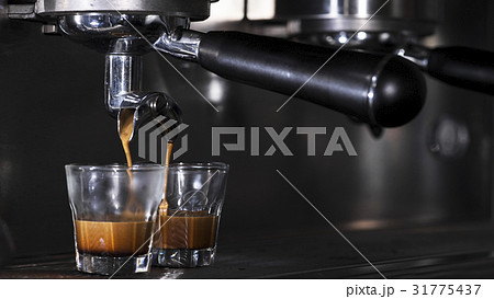 Coffee machine brewing hot espresso 31775437