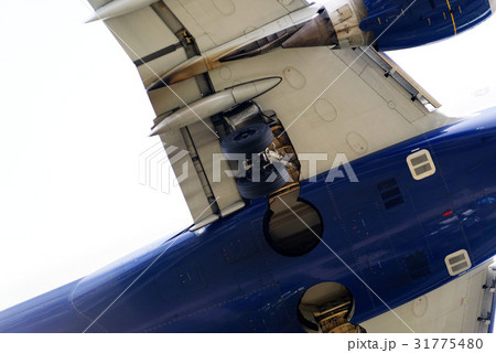The underside of a modern airplane with its flaps 31775480