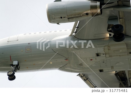 The underside of a modern airplane with its flaps 31775481