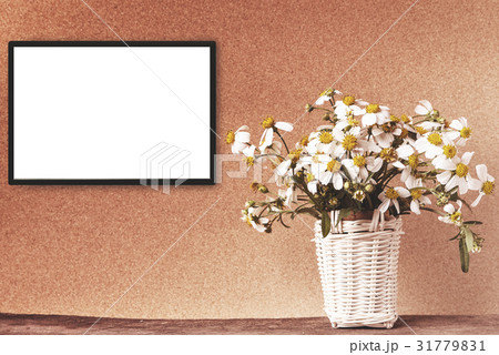 Blank white frame mockup with chamomile flowers 31779831
