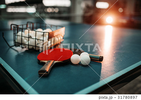 Ping pong table, rackets and balls in a sport hall 31780897
