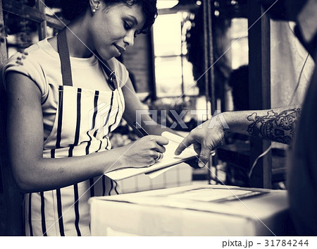 Man Deliver Mail Box to Woman in front of Stop 31784244
