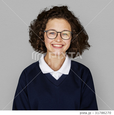 Portrait studio shoot of schoolgirl in uniform with smiling Portrait studio shoot of schoolgirl in uniform with smiling 31786270