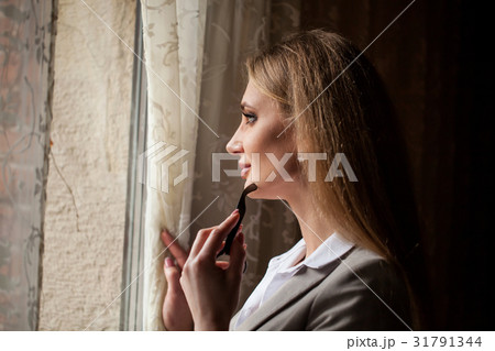 Close up shot of businesswoman standing by the Close up shot of businesswoman standing by the 31791344