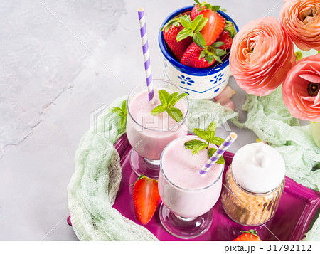 Strawberry milk shake for breakfast 31792112