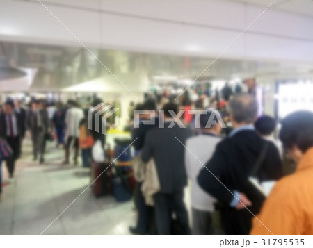 Abstract blur of Passengers waiting in a row Abstract blur of Passengers waiting in a row 31795535
