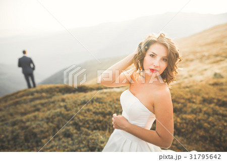 Happy beautiful wedding couple bride and groom at Happy beautiful wedding couple bride and groom at 31795642