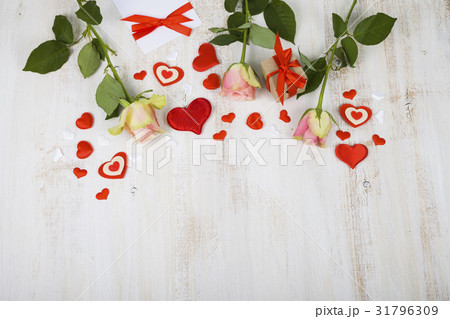 Pink roses,  gift and hearts 31796309