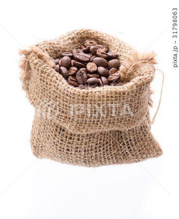Coffee beans in burlap bag isolated on white Coffee beans in burlap bag isolated on white 31798063