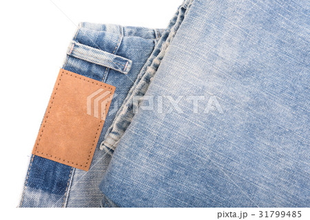 Jeans with leather label isolated on white  31799485
