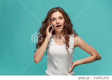 The young woman's portrait with happy emotions The young woman's portrait with happy emotions 31801202