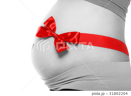Belly of a pregnant woman 31802204