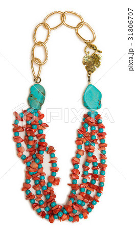 Nice necklace with red beads isolated on white Nice necklace with red beads isolated on white 31806707