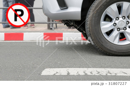 No parking sign at red stripes sign on street No parking sign at red stripes sign on street 31807227