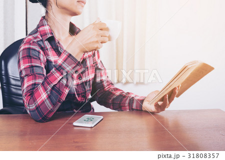Casual businesswoman drinking coffee Casual businesswoman drinking coffee 31808357