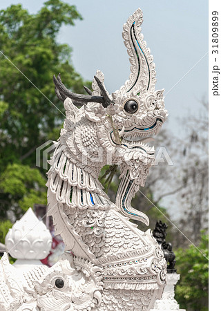 statue of white serpent in the temple. statue of white serpent in the temple. 31809899