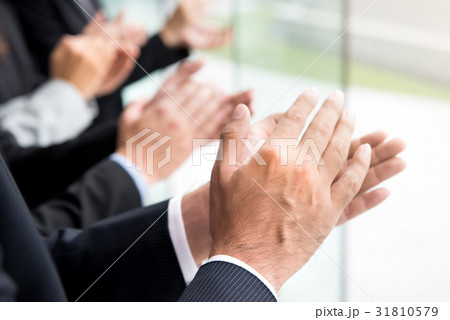 Business people clapping their hands Business people clapping their hands 31810579