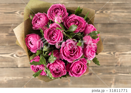 Pink peony roses in vase. retro styled photo. Pink peony roses in vase. retro styled photo. 31811771