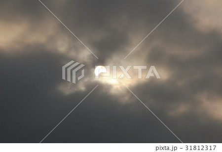 solar eclipse in dull day 31812317