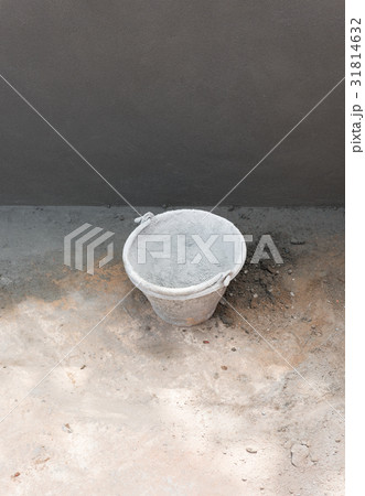 Pail for cement work on concrete background Pail for cement work on concrete background 31814632
