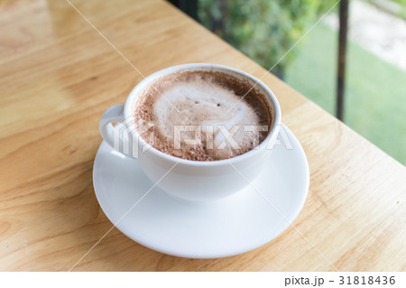 hot coffee mocha with foam milk in the cafe hot coffee mocha with foam milk in the cafe 31818436