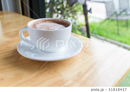 hot coffee mocha with foam milk in the cafe 31818437