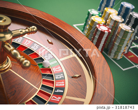 Casino Roulette Wheel With Casino Chips On Greenのイラスト素材