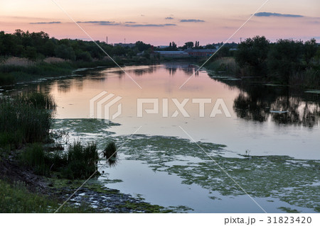 Sunset Mertvovid riverbank in Voznesensk, Ukraine. 31823420