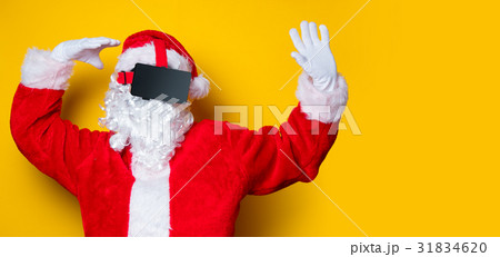 Funny Santa Claus have a joy with VR glasses 31834620