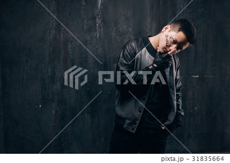 Dangerous tattooed ghetto gang member man Dangerous tattooed ghetto gang member man 31835664