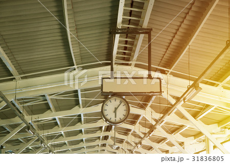 old analog clock on the roof of railway station old analog clock on the roof of railway station 31836805