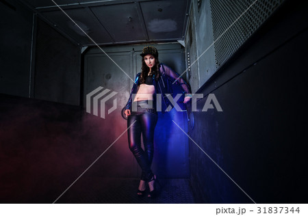 Beautiful young woman in the old elevator 31837344