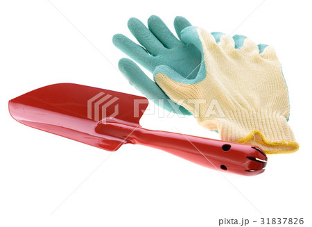 Red spade and green gloves isolated over white Red spade and green gloves isolated over white 31837826
