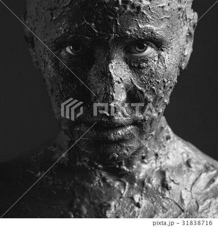 Scary face in clay 31838716