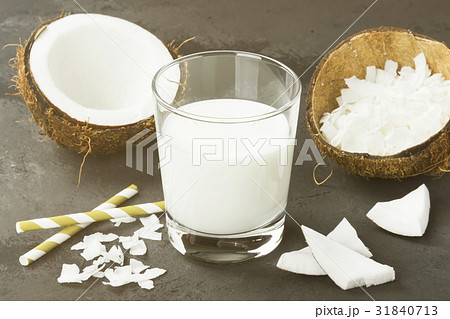 Vegan coconut milk in glass. Non-dairy milk Vegan coconut milk in glass. Non-dairy milk 31840713