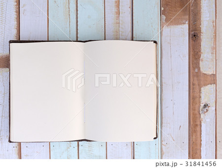 Top view of recycle notebook on retro wooden board Top view of recycle notebook on retro wooden board 31841456