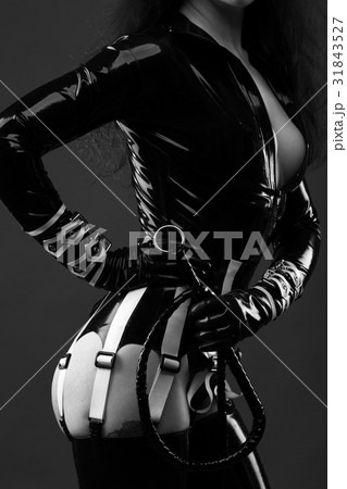 Sensual woman in black latex costume Sensual woman in black latex costume 31843527