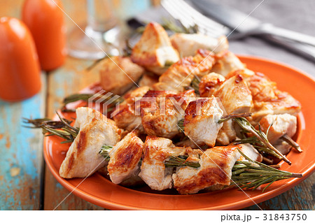 Chicken souvlaki on rosemary sticks Chicken souvlaki on rosemary sticks 31843750