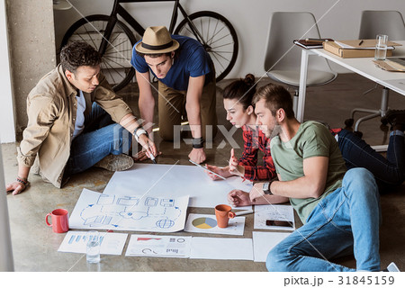 Pensive young colleagues starting business 31845159