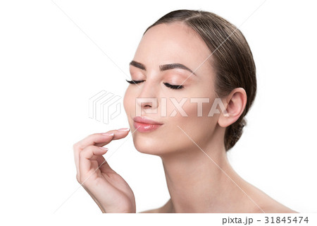 Joyful attractive girl feeling pleasure using 31845474