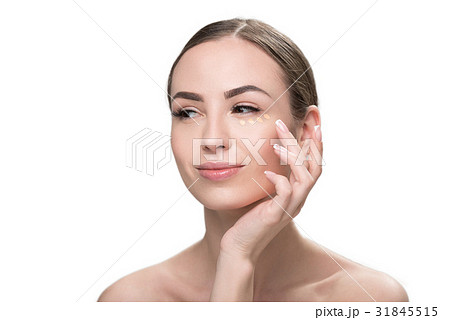 Happy beautiful girl putting decorative visage 31845515