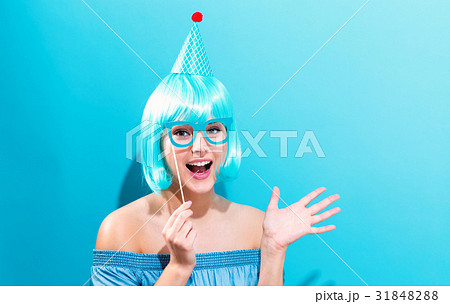 Beautiful woman in a bright blue wig Beautiful woman in a bright blue wig 31848288