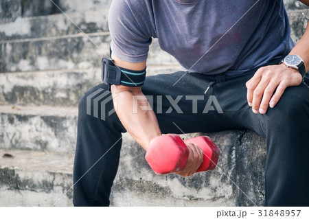 Handsome man doing push ups exercise 31848957