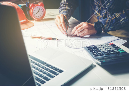 Architect or engineer working in office Architect or engineer working in office 31851508