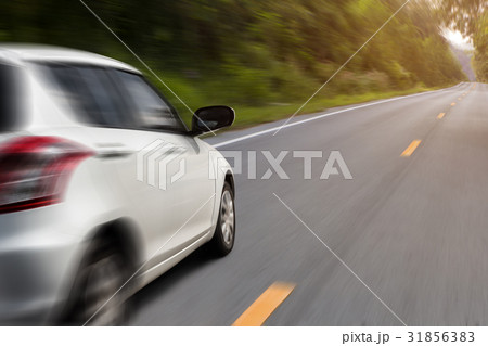 movement car speed on the road rural view 31856383