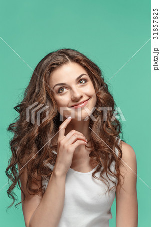 The young woman's portrait with happy emotions The young woman's portrait with happy emotions 31857825