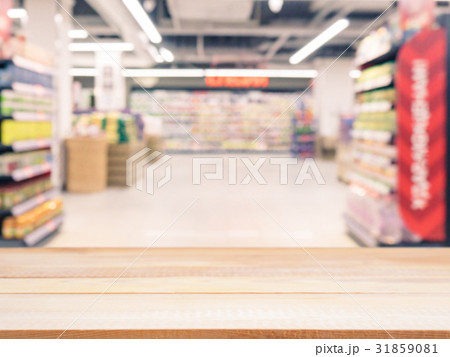 Empty table in front of blurred background Empty table in front of blurred background 31859081
